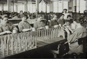 Women at the Lincoln Motor Company plant working on the Liberty engine during World War I, 1917-1918.