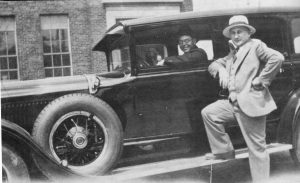 Stanley Swiatkowski with Rev. Vincent Anuszkiewicz, pastor of St. Barbara parish from 1925 – 1941, in front of the Church-School building, ca. 1928. Ibid.